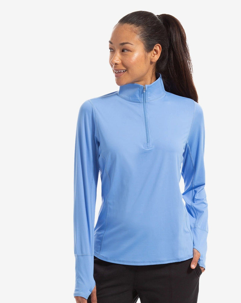 BloqUV women's long sleeve UV relaxed mock zip top in indigo blue.