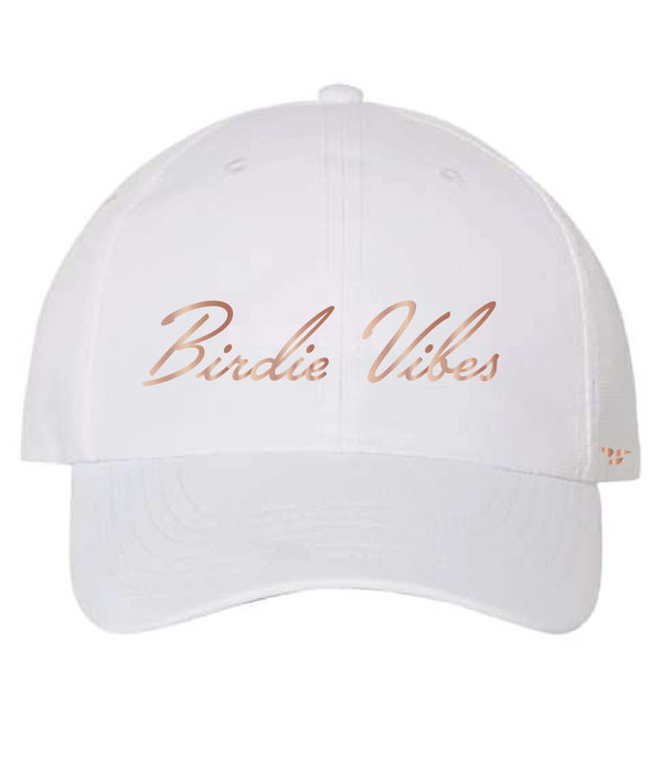 Front view of a white dad hat with rose gold foil printing that reads "BIRDIE VIBES".